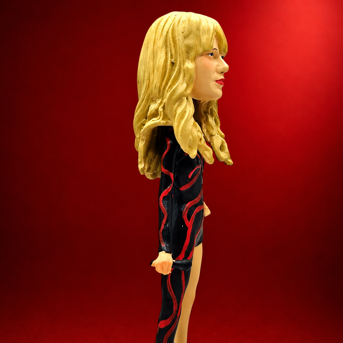 Figuras Bobblehead de Taylor Swift y Rosalía