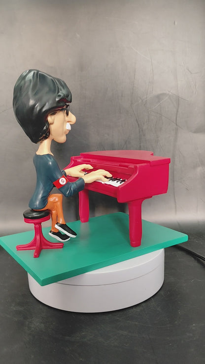 Figura Caricatura de Charly García